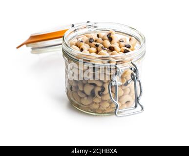 Marinated black eyed beans in jar isolated on white background. Stock Photo
