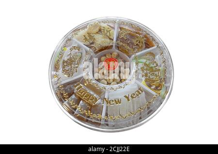 Lunar New Year celebration snacks combo with a word in the center means 'blessing' (isolated on white background) Stock Photo