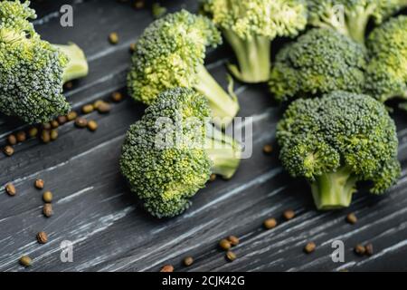 close up view of fresh green broccoli on wooden surface Stock Photo