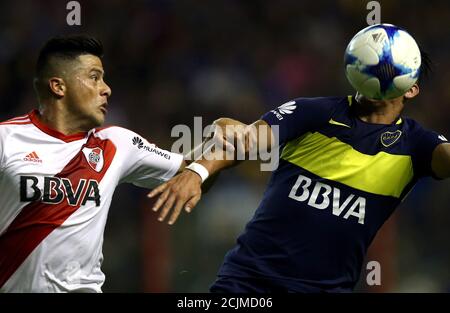 River Plate S Jorge Moreira R In Action Against Guarani S Fidencio Oviedo L During The Soccer Match Of The Copa Libertadores Between River Plate And Guarani In The Monumental Stadium Of Buenos Aires
