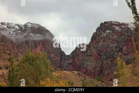 Rocky mountains behind cloud in Armenia Stock Photo