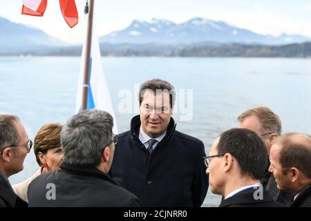Markus Soeder, Prime Minister of Bavaria, meets with leaders of different alpine regions on a boat on lake Chiemsee near Prien am Chiemsee, Germany April 4, 2019. REUTERS/Andreas Gebert