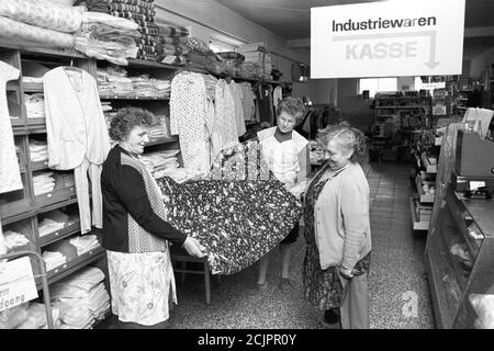 30 November 1986, Saxony, Sitzenroda: In the mid-1980s, a so-called complex sales outlet in the village of Sitzenroda near Torgau supplied the villagers with food and goods for daily use, here industrial goods and clothing. Exact date of recording not known. Photo: Volkmar Heinz/dpa-Zentralbild/ZB Stock Photo