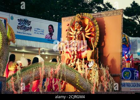 Kolkata, West Bengal, India, October 2020: People or women celebrating Durga Puja or Durgotsav. Biggest religious festival of Hinduism. Puja carnival Stock Photo