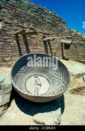 The Anasazi and Ancestral Puebloan fertility god Kokopelli as a female instead of a male painted on a thousand year old pottery bowl in New Mexico. Stock Photo