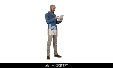 Handsome arabic business man using tablet on white background. Stock Photo