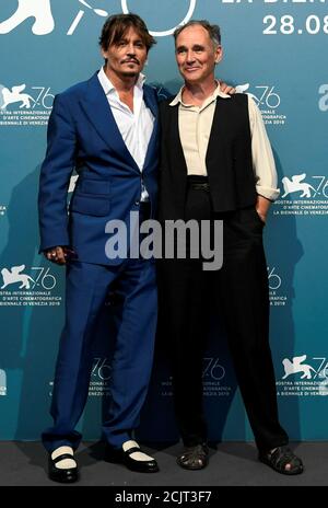 The 76th Venice Film Festival - Screening of the film 'Waiting for the Barbarians' in competition - Photocall - Venice, Italy September 6, 2019 - Actors Johnny Depp and Mark Rylance pose. REUTERS/Piroschka Van De Wouw
