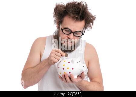 Crazy bearded man with piggy bank Stock Photo