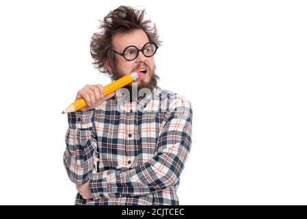 Crazy bearded man with big pencil Stock Photo