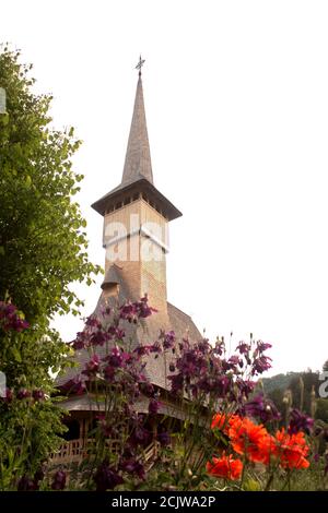 Barsana Monastery, Romania. The 18th century wooden church, historical monument built in the local traditional style. Stock Photo