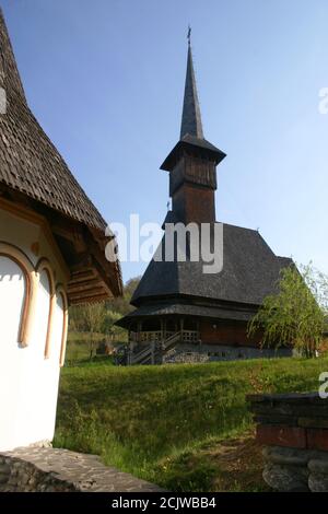 Barsana Monastery, Romania. The 18th century wooden church, historical monument built in the local traditional style. Stock Photo