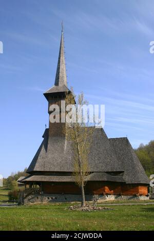 Barsana Monastery, Romania. The 18th century wooden church, historical monument built in the local traditional style. Stock Photo