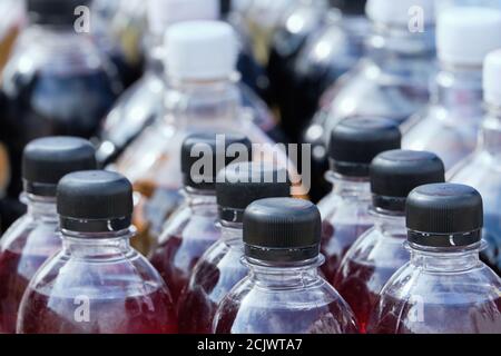 Street shop with wine in plastic bottles. Stock Photo