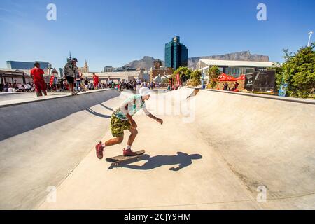 Teenager skating at Battery Park at the V&A Waterfront, Cape Town Stock Photo