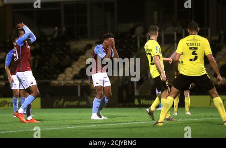 Aston Villa's Ollie Watkins (centre) reacts to a missed chance during the Carabao Cup match at the Pirelli Stadium, Burton. Stock Photo
