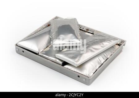 Lithium-ion battery pack from laptop, which has expanded. Stock Photo