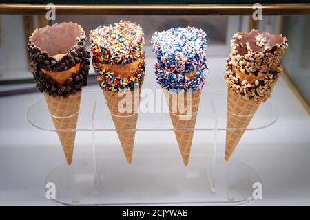 Four Decadent Ice Cream Cones Stock Photo