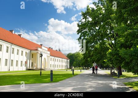 VILNIUS, LITHUANIA - JULY 14, 2020: People walking down the streets of Vilnius Old Town. Beautiful sunny summer day in the capital of Lithuania. Stock Photo