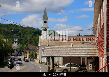 The general view of town of Wilmington and Vermont route 100 with traffic lights and Wilmington Baptist Church.Wilmington.Vermont.USA Stock Photo