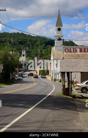 The general view of town of Wilmington and Vermont route 100 with Wilmington Baptist Church in the background from Main Street.Wilmington.Verm Stock Photo