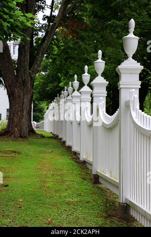 Curved white wooden fence of Old Bennington Cemetery.First Congregational church of Bennington.Bennington.Vermont.USA Stock Photo