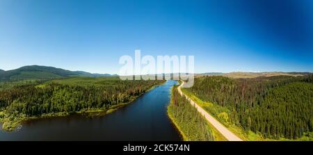 Scenic Panoramic Lake View of Curvy Road in Canadian Nature Stock Photo