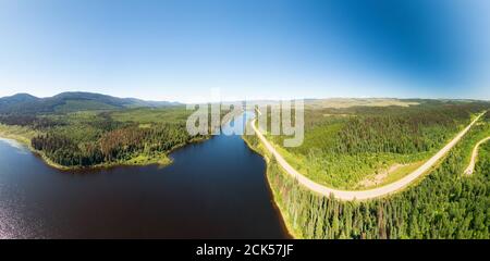 Scenic Panoramic Lake View of Curvy Road in Canadian Nature Stock Photo