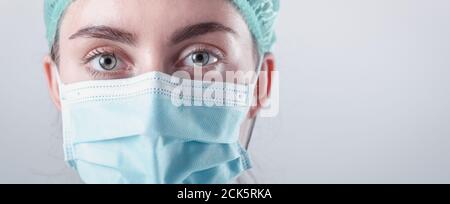 Medical Surgical Doctor and Health Care, Portrait of Surgeon Doctor in PPE Equipment on Isolated Background. Medicine Female Doctors Wearing Face Mask Stock Photo