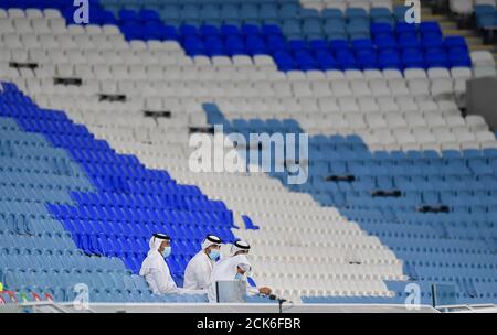 Beijing, Capital of Qatar. 14th Sep, 2020. Local organizing officers watch the AFC Asian Champions League group B football match between Shabab Al Ahli of United Arab Emirates and Shahr Khodrou of Iran at Al Janoub Stadium in Doha, Capital of Qatar, Sept. 14, 2020. Shabab Al Ahli won 1-0. Credit: Nikku/Xinhua/Alamy Live News Stock Photo