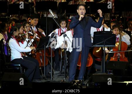Peruvian tenor Juan Diego Florez performs during a concert at the National Stadium, in Lima, Peru, July 1, 2017. REUTERS/Guadalupe Pardo