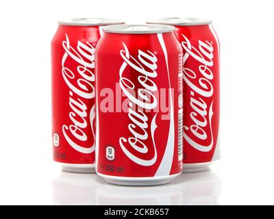 BUCHAREST, ROMANIA - DECEMBER 22, 2016. Cans of Coca-Cola isolated on white background Stock Photo