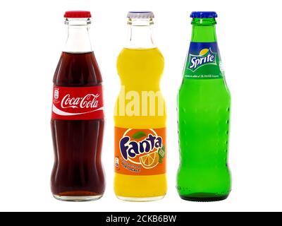 BUCHAREST, ROMANIA - DECEMBER 30, 2017. Bottles of Coca-Cola, Fanta and Sprite isolated on white Stock Photo