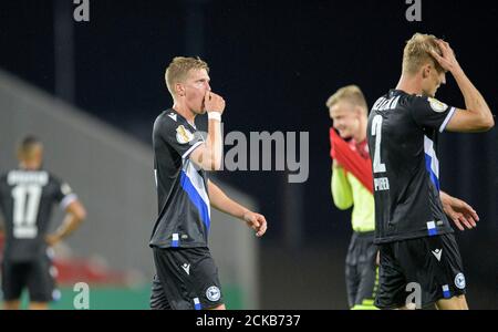 Eat, Deutschland. 14th Sep, 2020. left to right Joakim NILSSON (BI), Amos PIEPER (BI) disappointed after the game football DFB Pokal 1st round, Rot-Weiss Essen (E) - Arminia Bielefeld (BI) 1: 0, on 09/14/2020 in Essen/Germany . Â | usage worldwide Credit: dpa/Alamy Live News Stock Photo