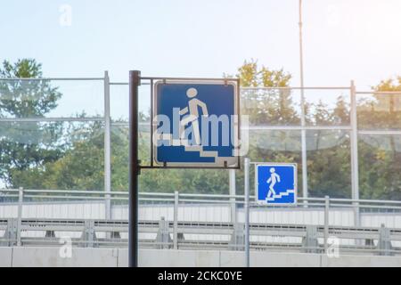 Two road signs for pedestrians - underground passage. Under the road junction in the city Stock Photo