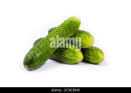 bunch of fresh cucumbers isolated on white background. Stock Photo