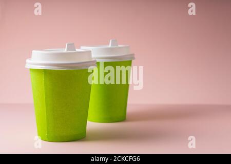 selective focus. paper cups for hot drinks coffee and tea, with a plastic lid, to take away. Copyspace Stock Photo