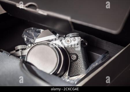 Returning a camera for repair to its manufacturer Stock Photo