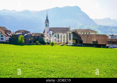 Panoramic view of Schwyz old town and Church of St. Martin. Switzerland. Stock Photo