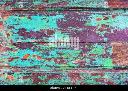 Abstract grunge wood planks texture background with peeling blue paint Stock Photo