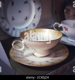 Old tea cup and old crockery. Stock Photo