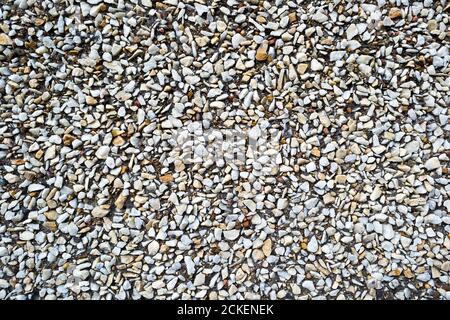 Close up of small rough gravel background texture Stock Photo