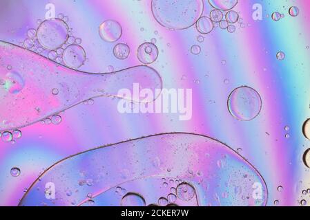 Holographic abstract background in pastel neon color picture made with oil, water and soap Stock Photo