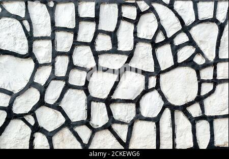 Stone wall surface texture as background. Closeup Stock Photo