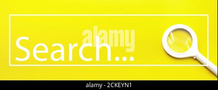 Close-Up Of Magnifying Glass On Yellow Background witn text Search. WEB SEARCH CONCEPT Stock Photo