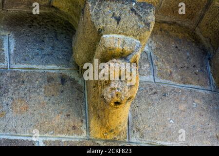 Ydes Bourg,  sculptures of Church Saint-Georges, Cantal department, Auvergne-Rhone-Alpes, France Stock Photo