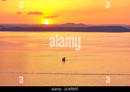 Vladivostok, Russia - Jun 11, 2020: view of the Amur Bay at sunset. Stock Photo