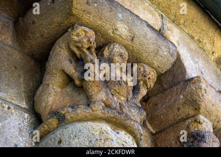 Ydes Bourg,  sculptures of Church Saint-Georges, Cantal department, Auvergne-Rhone-Alpes, France Stock Photo