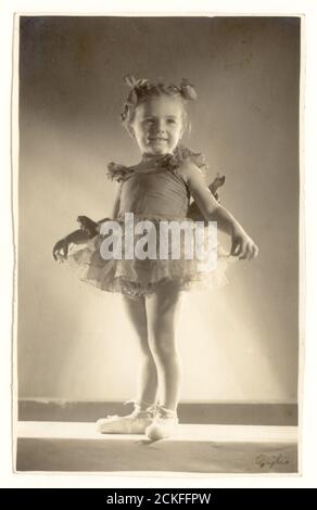 1950's studio portrait of young girl in her ballet costume, U.K. Stock Photo