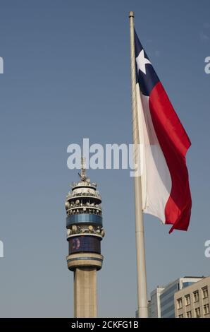 Entel Tower and flag of Chile in the Libertador Bernardo O'Higgins Avenue. Santiago de Chile. Chile. Stock Photo