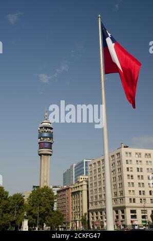 Santiago de Chile. Chile. January 15, 2012: Entel Tower and flag of Chile in the Libertador Bernardo O'Higgins Avenue. Stock Photo
